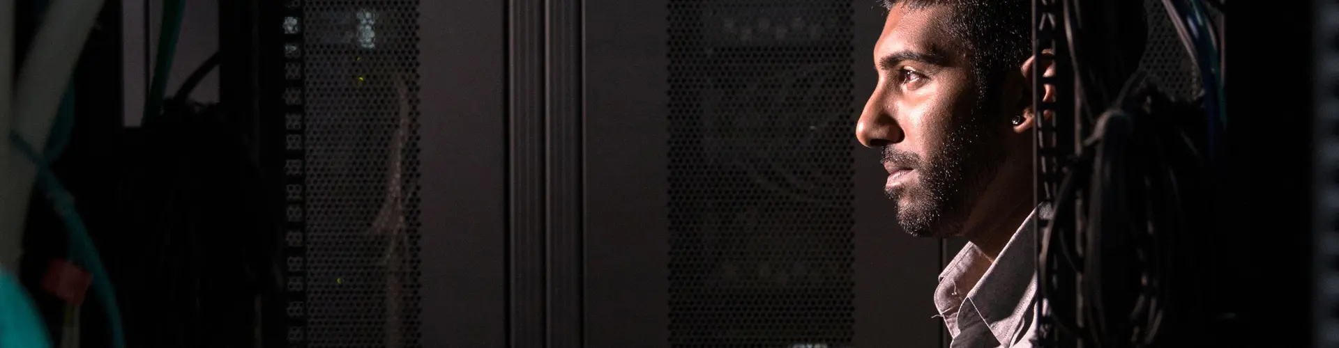 Male working at a data center