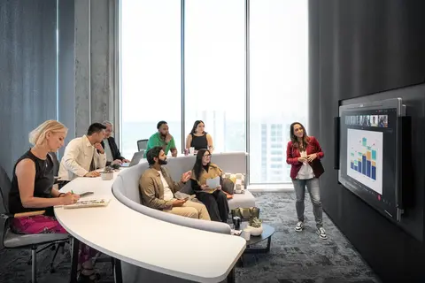 people are having a meeting in a conference room